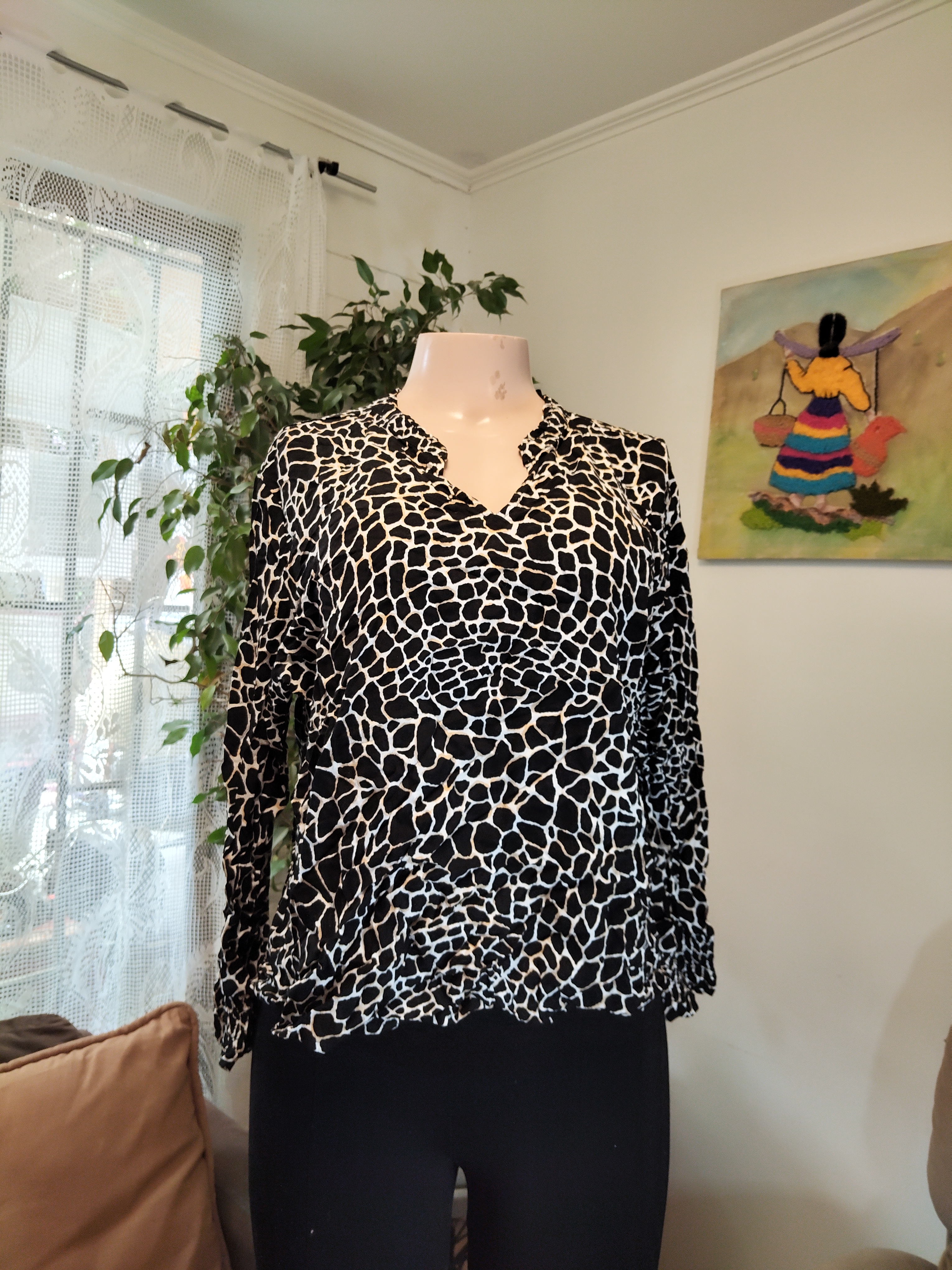 Blusa animal print jirafa negro y blanco